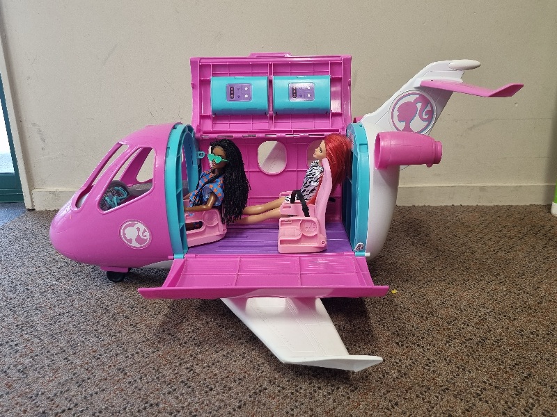 Barbie aeroplane very online